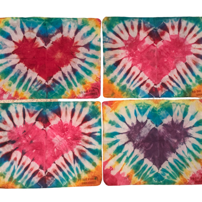 Four tie dye heart shammies on a white background
